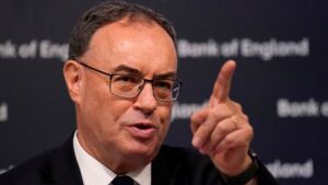 FILE PHOTO: Andrew Bailey, Governor of the Bank of England, gestures as he addresses the media during a press conference at the Bank of England in London, Britain, August 1, 2024. Alberto Pezzali/Pool via REUTERS/File Photo