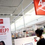 A customer shops at the Argos store inside a Sainsbury's supermarket in Richmond, West London, Britain February 21, 2024. REUTERS/Isabel Infantes