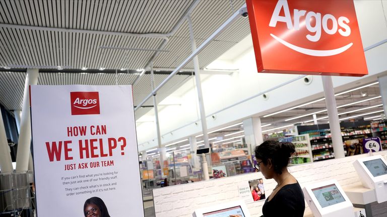 A customer shops at the Argos store inside a Sainsbury's supermarket in Richmond, West London, Britain February 21, 2024. REUTERS/Isabel Infantes