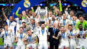 Real Madrid's players celebrate with the trophy after winning the Champions League final. Pic: AP